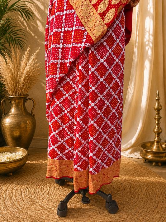 Red bandhani saree with Lakhnovi work