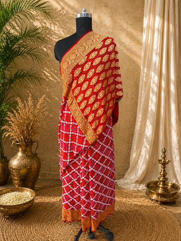 Red bandhani saree with Lakhnovi work
