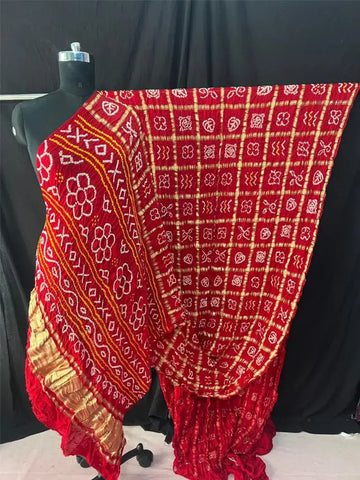 Gaji silk bandhani saree in Gharchola style Meroonish Red